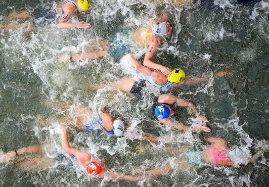 Image for story: Olympic triathlete who fell ill after swim in Seine River says virus made her sick