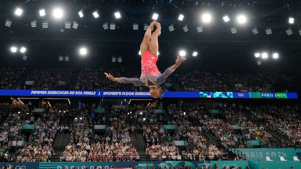 Simone Biles, of the United States, competes during the women's artistic gymnastics individual floor finals at Bercy Arena at the 2024 Summer Olympics, Monday, Aug. 5, 2024, in Paris, France. (AP Photo/Abbie Parr)