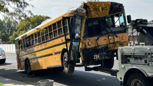 Officials have reported a head-on collision between a school bus and a garbage truck in the Spanish Fork area. (Photo: KUTV)