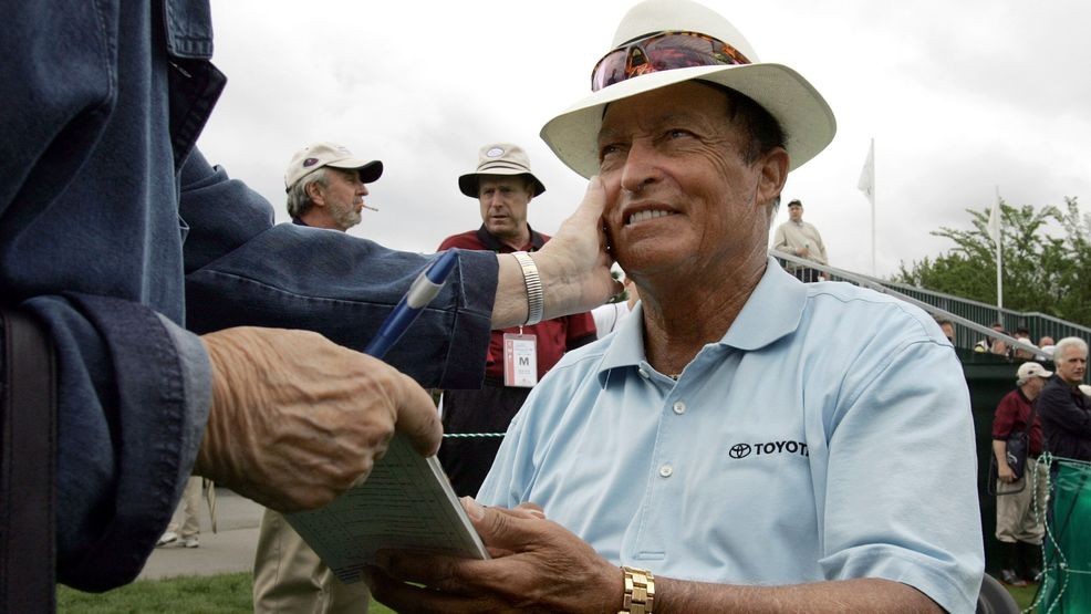 FILE - Chi Chi Rodriguez, of Puerto Rico, smiles while signing an autograph at the Nashawtuc Country Club in Concord, Mass., Friday, June 9, 2006. (AP Photo/Steven Senne, File)