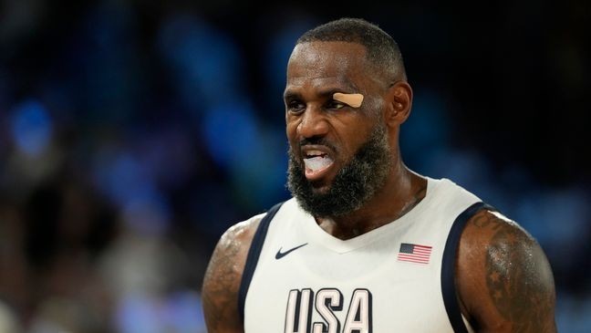 United States' LeBron James (6) reacts to a call against Serbia during a men's semifinals basketball game at Bercy Arena at the 2024 Summer Olympics, Thursday, Aug. 8, 2024, in Paris, France. (AP Photo/Mark J. Terrill)