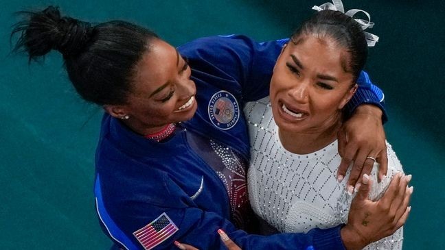 Jordan Chiles, of the United States, and Simone Biles, of the United States, celebrate after the women's artistic gymnastics individual floor finals in Bercy Arena at the 2024 Summer Olympics, Monday, Aug. 5, 2024, in Paris, France. Biles won the silver medal and Chiles the bronze medal. (AP Photo/Morry Gash)