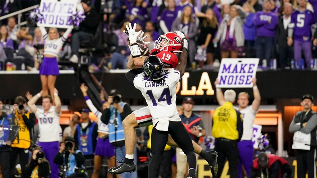 Georgia tight end Brock Bowers (19) makes a touchdown catch against TCU safety Abraham Camara (14) during the second half of the national championship NCAA College Football Playoff game, Monday, Jan. 9, 2023, in Inglewood, Calif. (AP Photo/Ashley Landis)