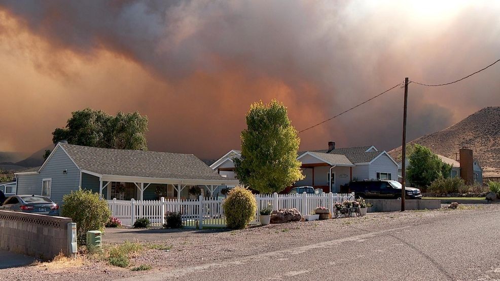 As wildfire season becomes increasingly unpredictable, fires burning even far from where you live could cost you money on the bills you pay.